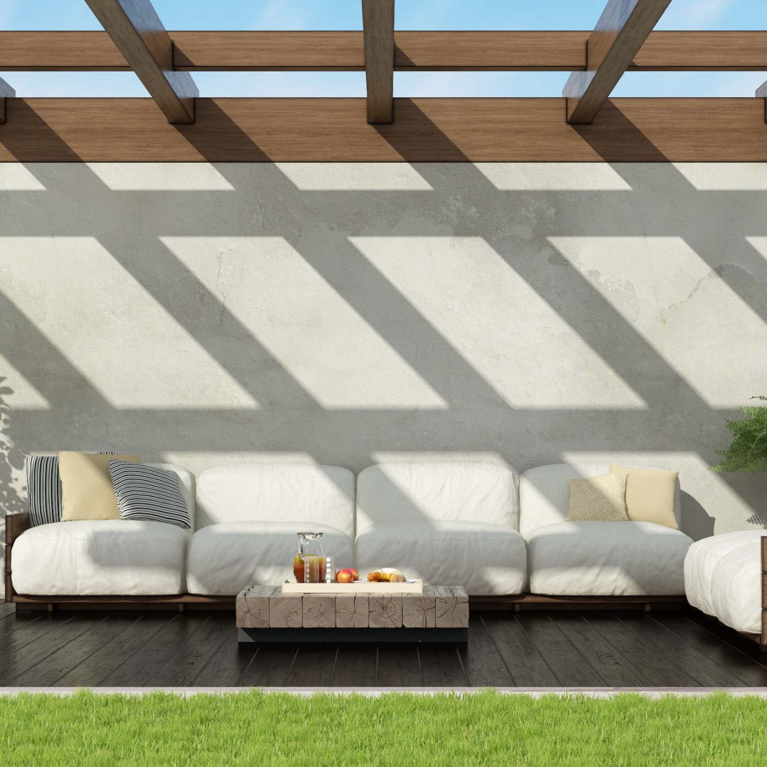 A collection of Jatiora Lux outdoor lounge chairs and tables.